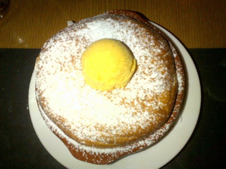 Coconut pineapple clafouti with sea buckthorn sorbet ($12)