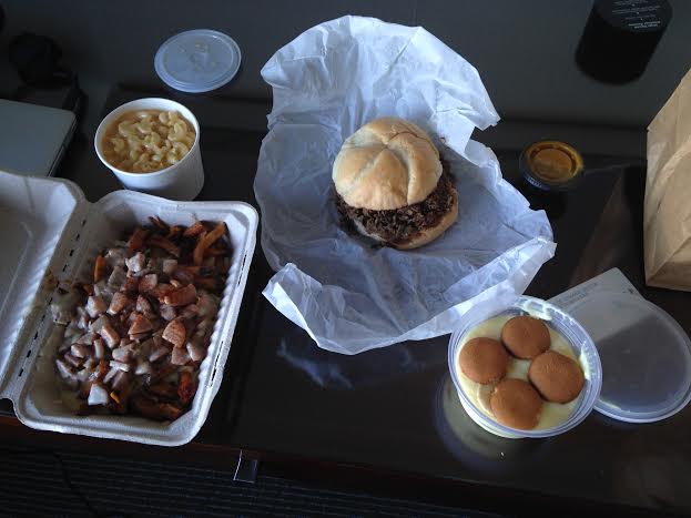 Mac and Cheese ($3.50), Brisket Sandwich $6.99), Banana Pudding ($4.25) and White Trah Fries ($6.25)